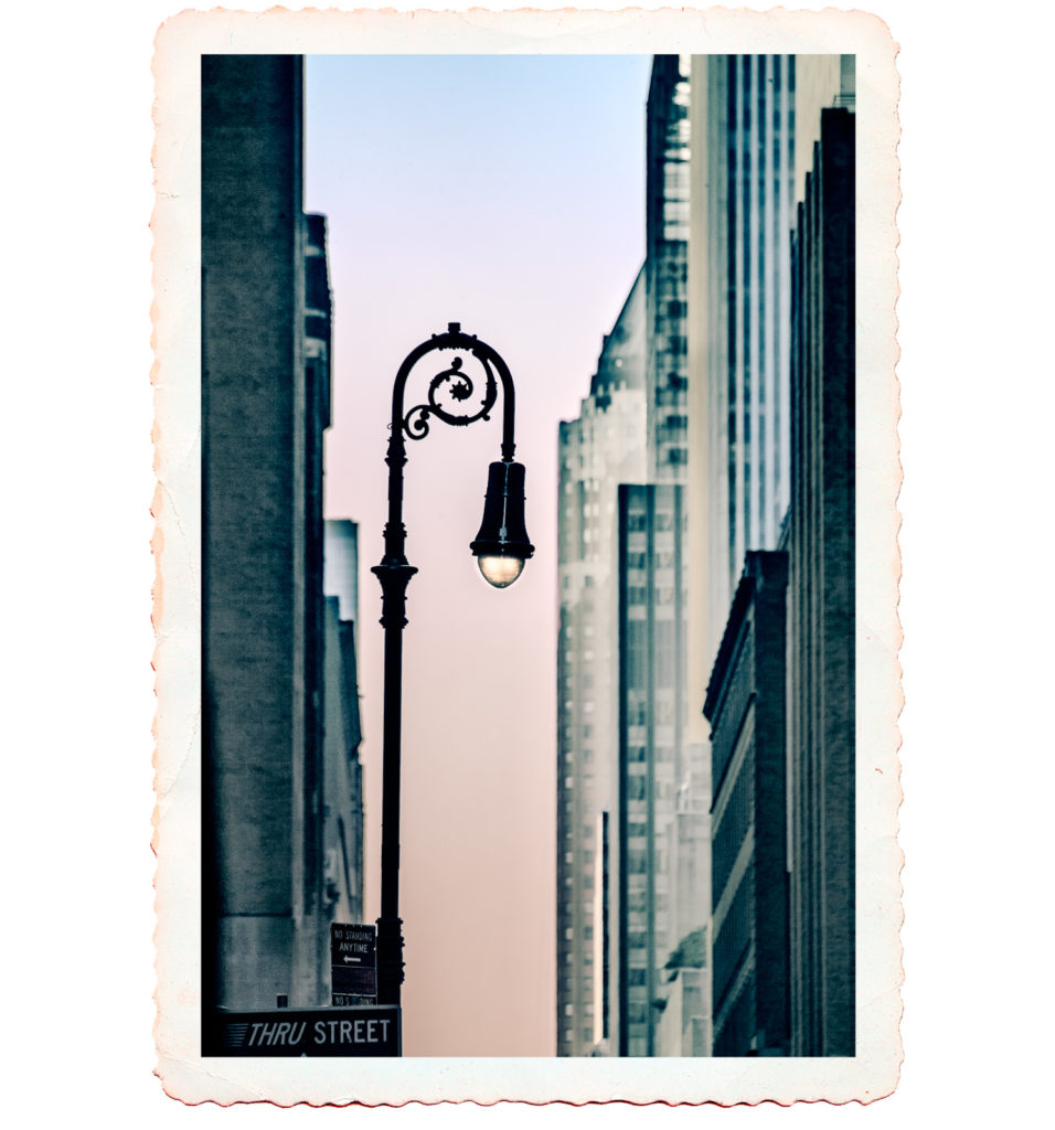 Colour Postcard photo of elegant wrought iron street lamp in New York City