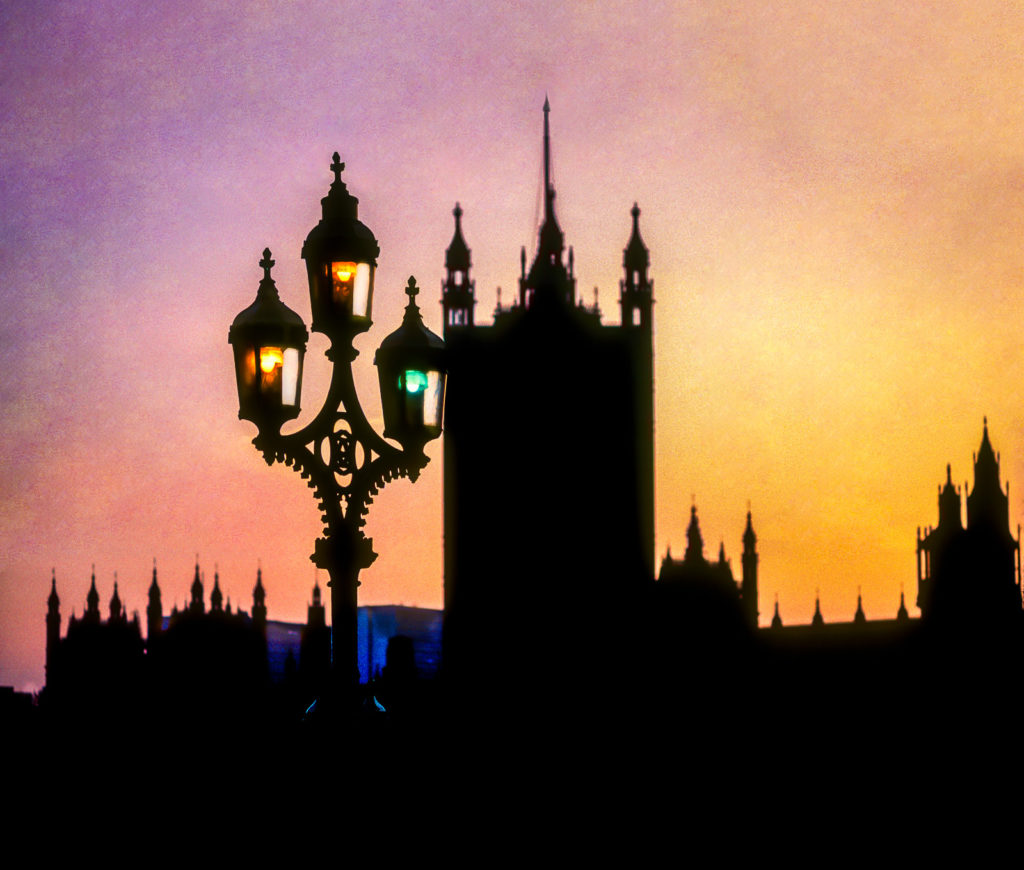 Photo of Street lamp sunset silhouette of Houses of Parliament, London, England